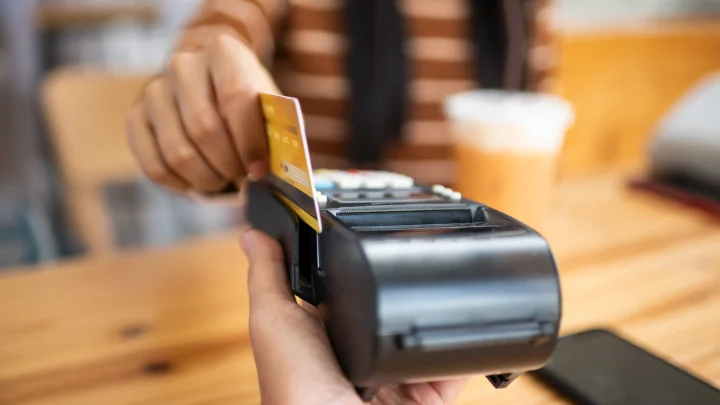Sick of credit card swipe fees? Blame businesses, not the banks.