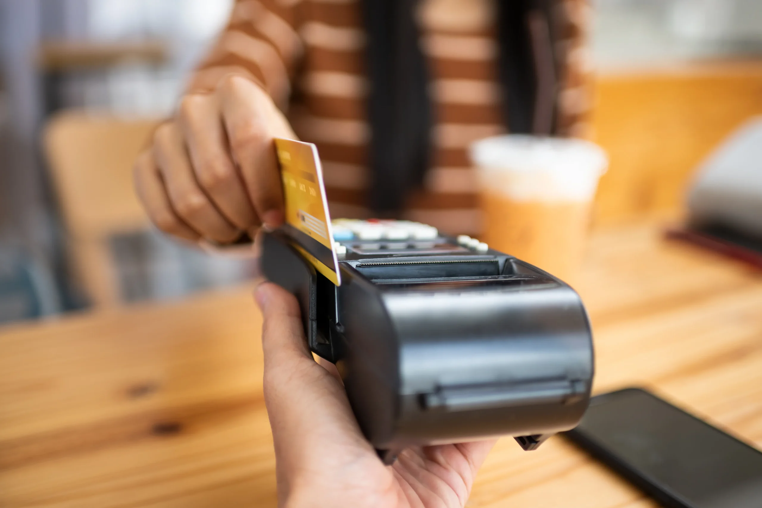 Sick of credit card swipe fees? Blame businesses, not the banks.