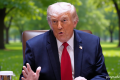 Trump signs scaled-back AI executive order